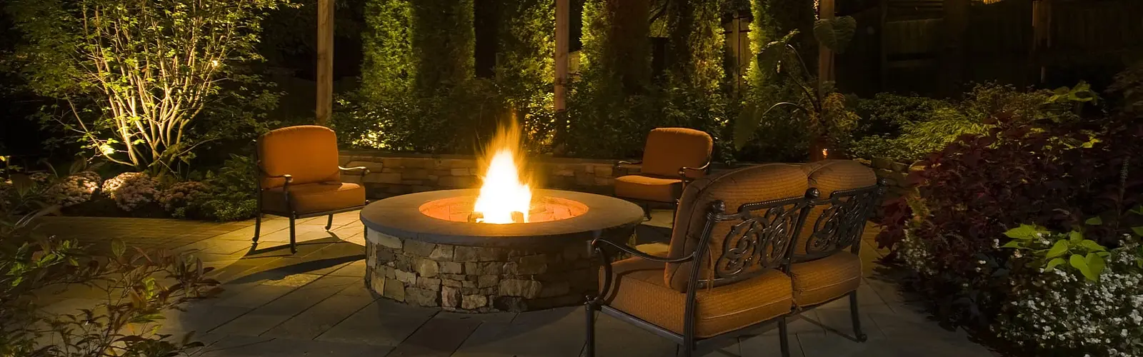 Outdoor fire pit with visible flame by Landscape St. Louis