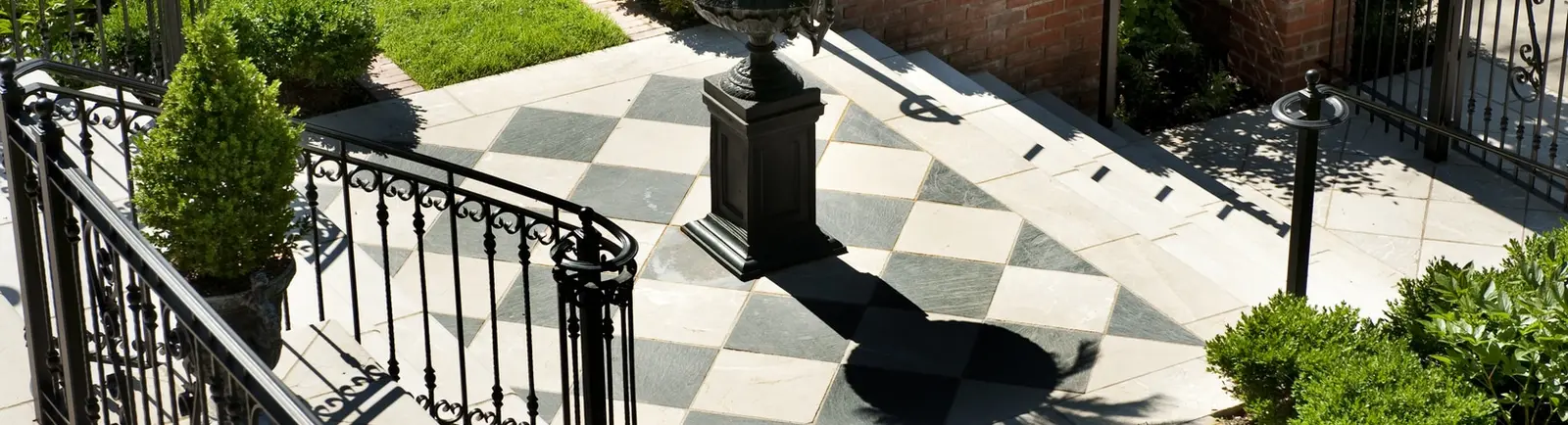 Paver patio surface and patterned stonework by Landscape St. Louis