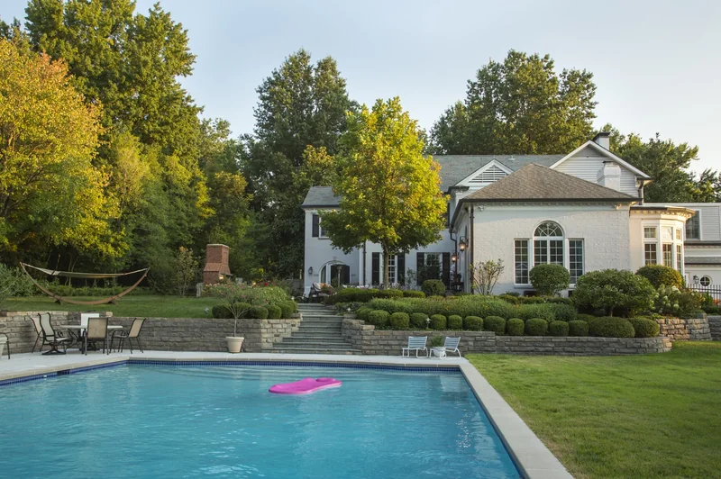 Large paver pool terrace and outdoor living surface